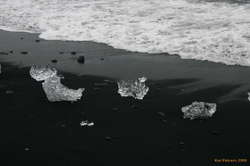 Drift ice washed back on shore
