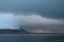 Leaving mixed weather behind at Hvalfjörður