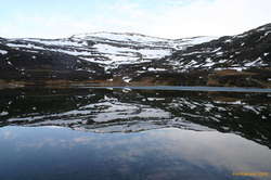 Reflections interrupted by ice, the head of Kjalkafjörður