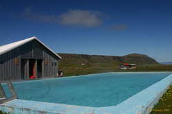 Wolfgang by the pool at Reykjafjörður