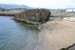 The secret beach, apparently the calling rock to Viðey