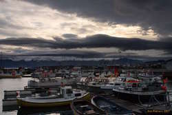 Húsavík harbour under threatening weather