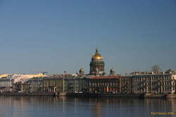 St Isaac's behind appartments along the Neva