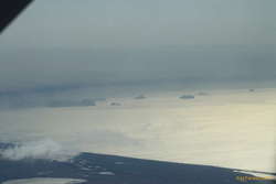 Ash haze over Vestmannaeyjar