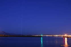 Yoko's light over the harbour mouth
